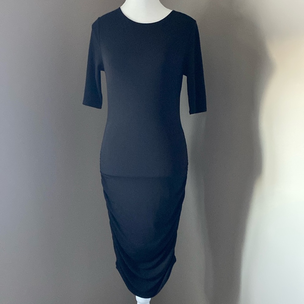 Alice and Olivia, black short-sleeved ruched dress. Size Small.